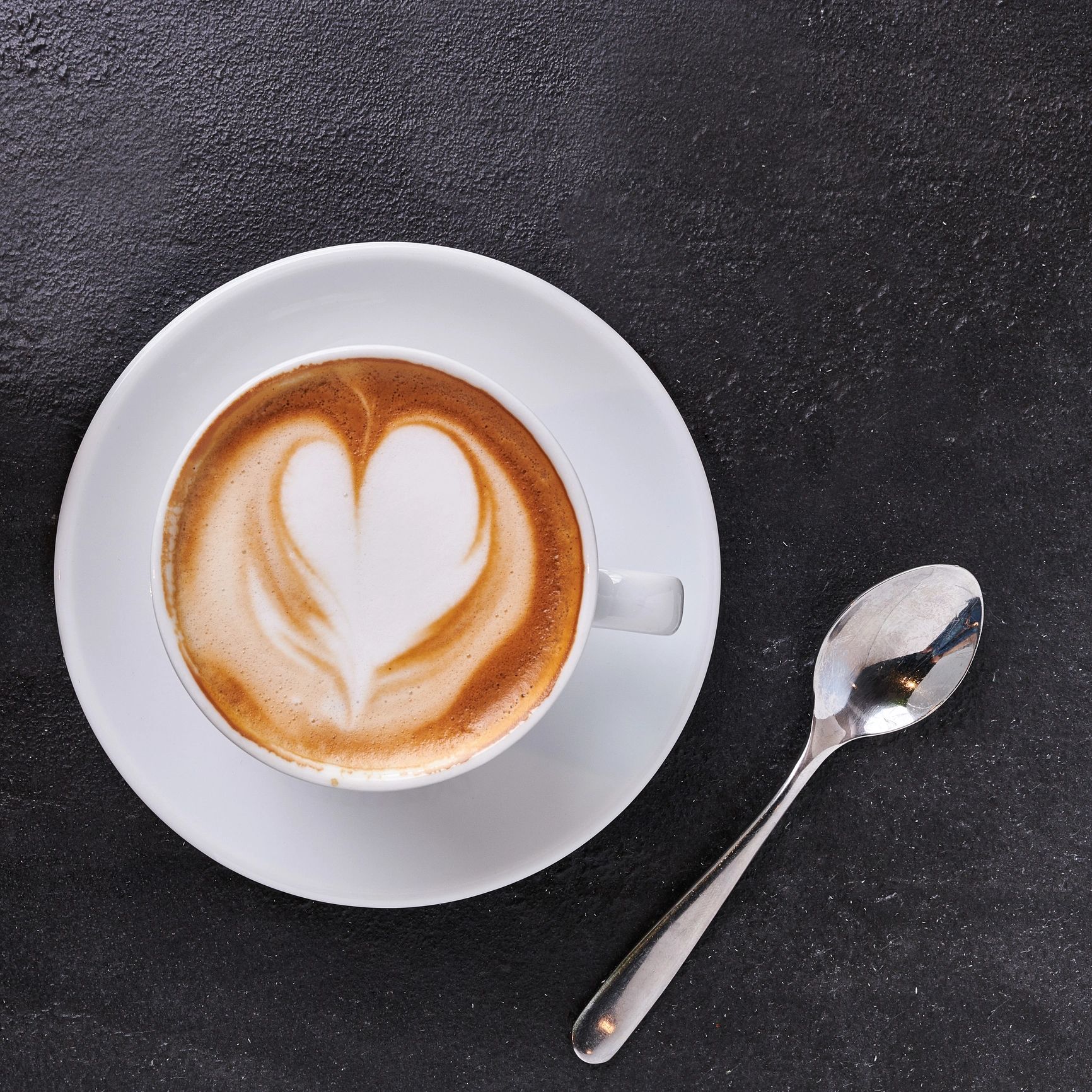 Creamy cappuccino with heart latte art