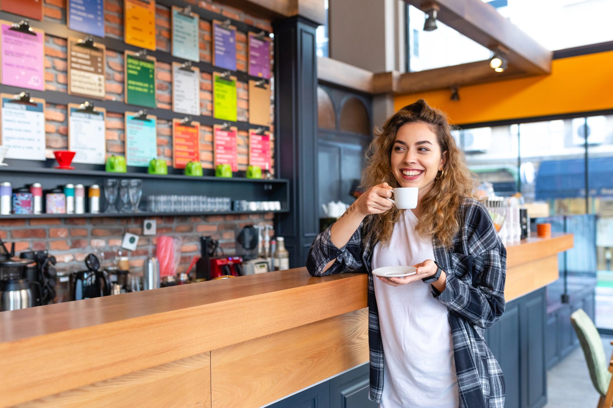 Young woman enjoying coffee in a cafe