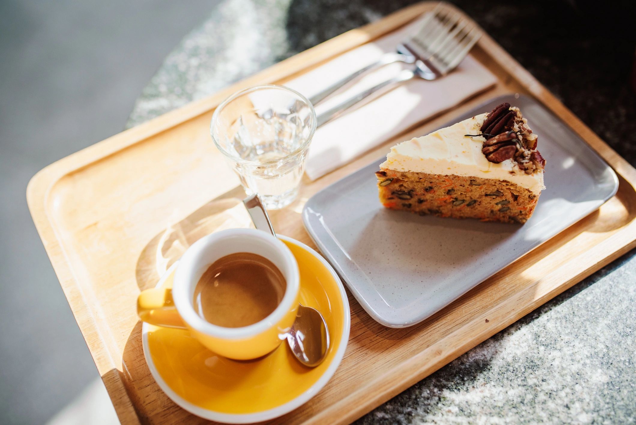 Coffee and carrot cake in a cafe